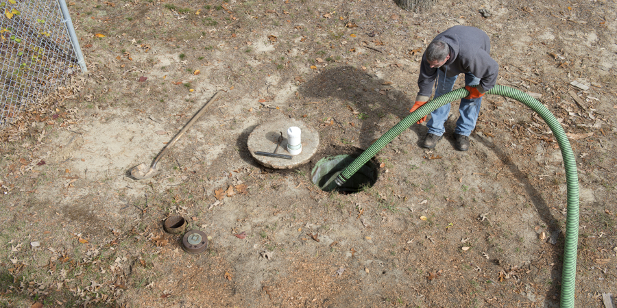 Septic Tank Servicers and Sewer Pipe Cleanersat work